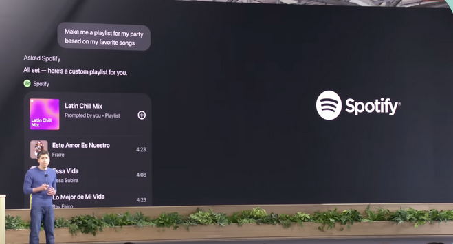OpenAI DevDay stage showing a Spotify app demo inside ChatGPT with a Latin Chill Mix playlist rendered in the conversation
